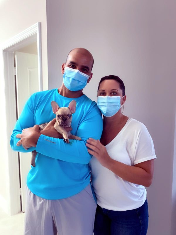 Happy family with their bulldog from Master Bulldogs Miami - Family 6