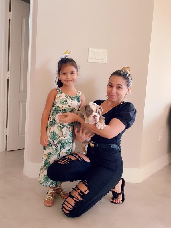 Happy family with their bulldog from Master Bulldogs Miami - Family 9