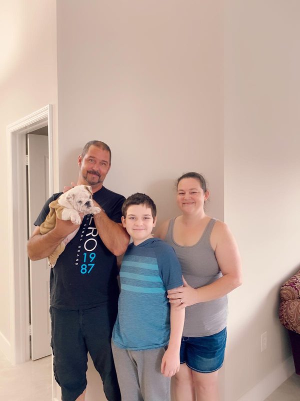 Happy family with their bulldog from Master Bulldogs Miami - Family 10